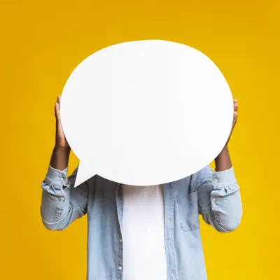 This is an image of a person holdind a speech bubble